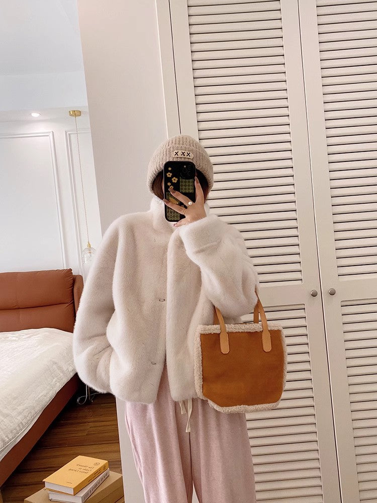 Manteau court en fourrure synthétique