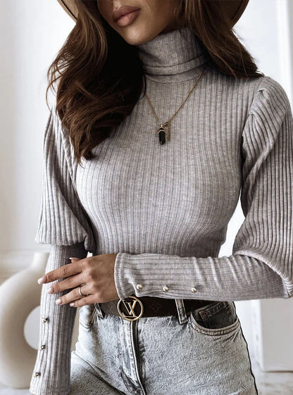 pull à col montant et bas évasé pour femme